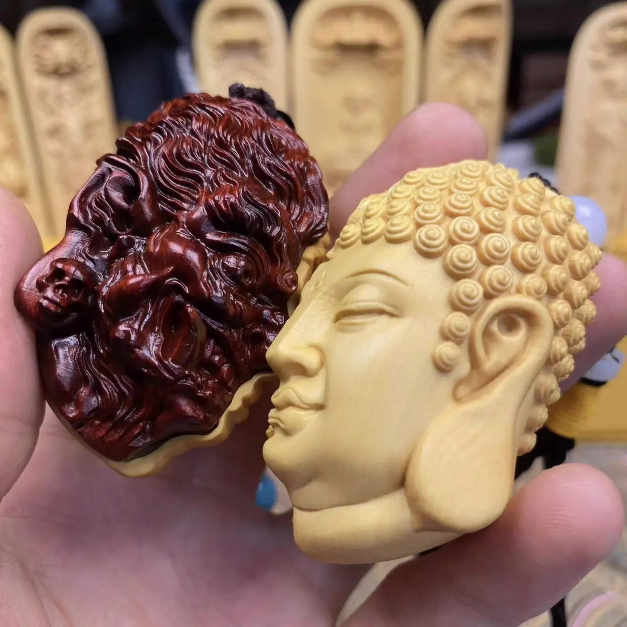 一面佛一面魔手把件寓意