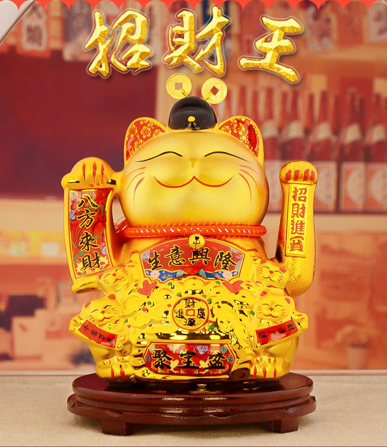 摆在店里的招财猫有举左手表示